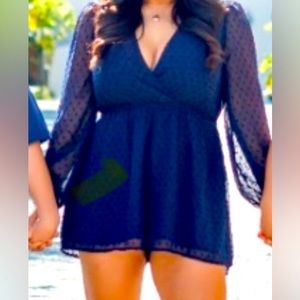 Blue romper with polka dots